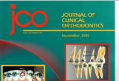 Retreatment of a Class II Patient with Short-Root Anomaly